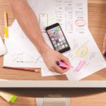 a man on a desk doing his planning for future events