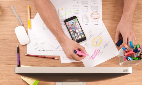 a man on a desk doing his planning for future events