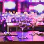 side view of wine glasses on a table