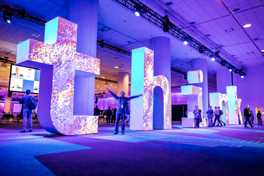 A view of a large sign display that displays the text think