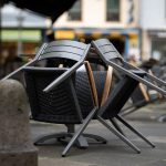 chairs packed away infront of closed restaurant