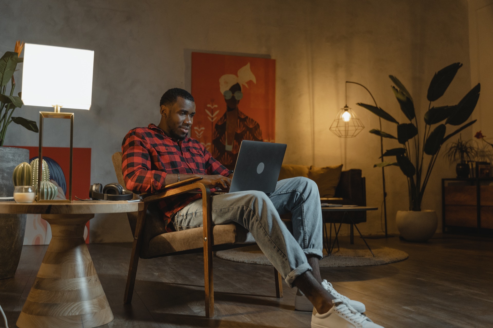 A man sitting on a chair in a video conference